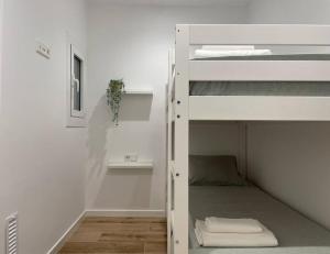 Posteľ alebo postele v izbe v ubytovaní Apartamento nuevo céntrico frente al mar en Palamós