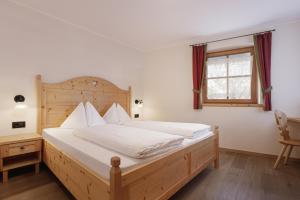 Posteľ alebo postele v izbe v ubytovaní Chalet Winklwiese