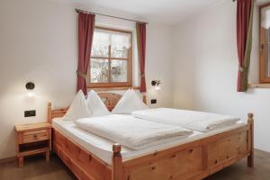 Posteľ alebo postele v izbe v ubytovaní Chalet Winklwiese
