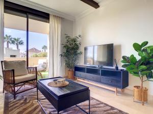 Et tv og/eller underholdning på Roda Golf Singapore Apartment - 8109