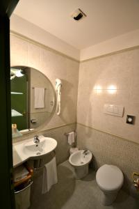 Ванная комната в Sun Hotel
