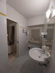 Koupelna v ubytování Hotel Cumilì