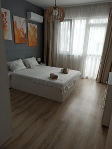 Postel nebo postele na pokoji v ubytování Apartment SEA HOLIDAYS
