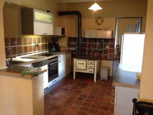 Kuchyň nebo kuchyňský kout v ubytování Holiday home in Zalaistvand 27940