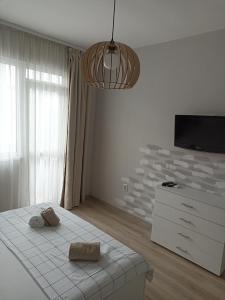 Postel nebo postele na pokoji v ubytování Apartment SEA HOLIDAYS