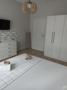 Postel nebo postele na pokoji v ubytování Apartment SEA HOLIDAYS