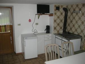 Kuchyň nebo kuchyňský kout v ubytování Oberhöher Apt Talblick