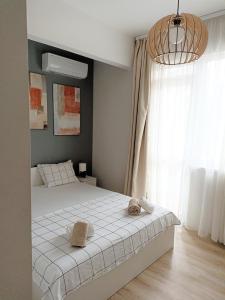 Postel nebo postele na pokoji v ubytování Apartment SEA HOLIDAYS