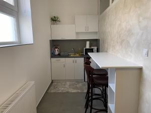 A cozinha ou kitchenette de TEPIĆ Garni Hotel