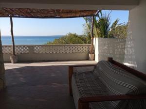 a balcony with a view of the ocean at Sea and sun in Cidade de Nacala