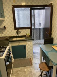 Kuchyň nebo kuchyňský kout v ubytování Apartamento Tres Soles Solo Familias