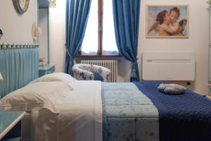 Postel nebo postele na pokoji v ubytování Podere di Sotto
