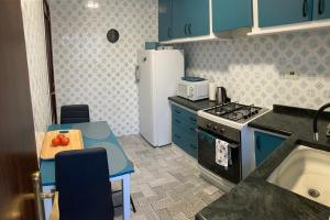 Kuchyň nebo kuchyňský kout v ubytování Apartamento Tres Soles Solo Familias