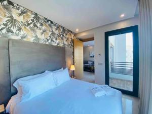 Katil atau katil-katil dalam bilik di Mogador Presidential Terrace - By AppartAli
