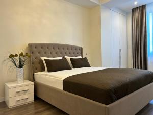 Ένα ή περισσότερα κρεβάτια σε δωμάτιο στο OLD TOWN CENTRAL PARK