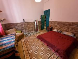 Postel nebo postele na pokoji v ubytování Shams House