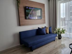 Posezení v ubytování Q Apart Enter- 2 pokojowy klimatyzowany apartament przy Manufakturze z garażem Gratis, FV