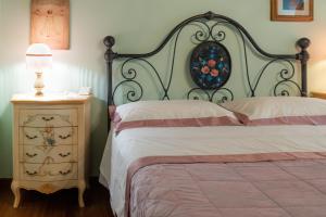 Postel nebo postele na pokoji v ubytování Podere di Sotto