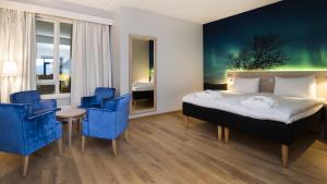Postel nebo postele na pokoji v ubytování Thon Hotel Nordlys