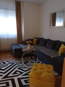 Posezení v ubytování APARTMAN SUNFLOWER