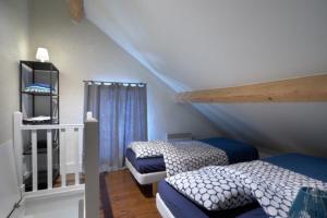 Postel nebo postele na pokoji v ubytování Moulin des Borderies