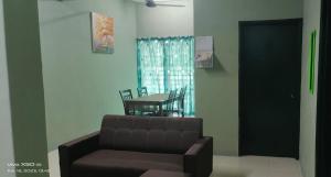 Un lugar para sentarse en Homestay Lumut Perak