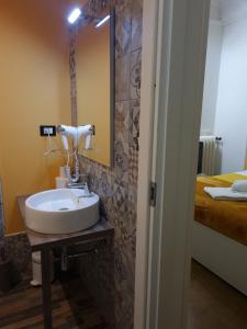 Koupelna v ubytování Granello Suite Central + 37 fotografií
