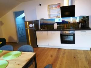 Kuchyň nebo kuchyňský kout v ubytování Quartier No. 7 - Serviced Living