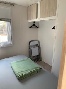 Posteľ alebo postele v izbe v ubytovaní Location Mobilhome