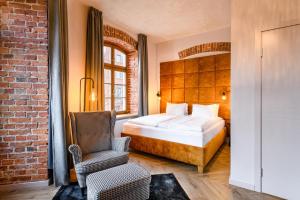 Postel nebo postele na pokoji v ubytování Adler Aparthotel