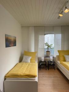 Postel nebo postele na pokoji v ubytování Gästewohnung Pohlheim Grüningen