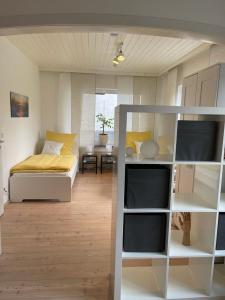 Postel nebo postele na pokoji v ubytování Gästewohnung Pohlheim Grüningen