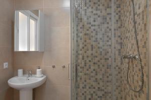 Kúpeľňa v ubytovaní HOMEABOUT Juan de Austria Apartments + 37 fotografií