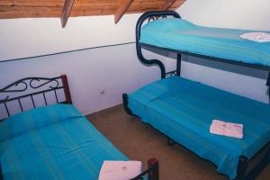 Postel nebo postele na pokoji v ubytování Ecovilla Cali