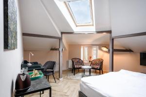 Postel nebo postele na pokoji v ubytování Adler Aparthotel