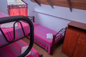 Postel nebo postele na pokoji v ubytování Ecovilla Cali