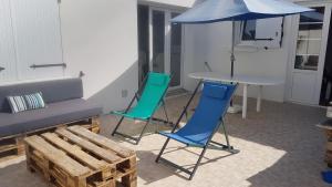 Χώρος καθιστικού στο GRAIN DE SABLE 600m des plages, et commerces,draps,vélos, WIFI , Parking