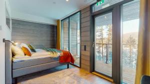 Tempat tidur dalam kamar di Kurula's Resort