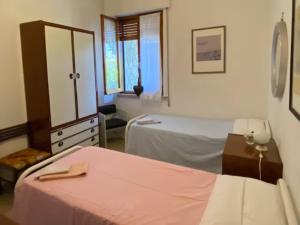 A bed or beds in a room at Via Verdi 14