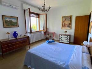 A bed or beds in a room at Via Verdi 14