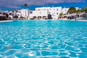 Bazén v ubytování Vivienda Vacacional Tamarindo nebo v jeho okolí