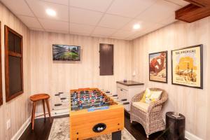 a game room with a chess board on a table at 1eight3 Retreat in Blowing Rock