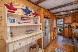 a kitchen with a counter with stars on it at Appalachian Escape in Blowing Rock