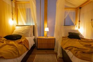 Floria Glamping Garden客房内的一张或多张床位