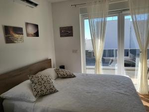 Letto o letti in una camera di Studio apartman Pegi