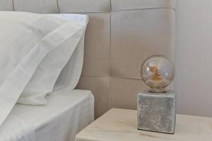 A bed or beds in a room at SAIL VILLA