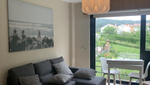 Zdjęcie z galerii obiektu Apartamento Quérote Fisterra1 w mieście Fisterra