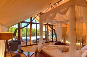 Floria Glamping Garden客房内的一张或多张床位