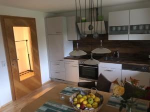 Kuchyň nebo kuchyňský kout v ubytování Babsi Appartments - leben am Land