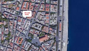 an overhead view of a city with a we are here sign at Sant'Agostino - Luxury Rooms in Messina